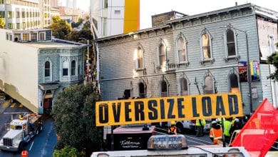 Parade follows 139-year-old San Francisco Victorian residence because it’s moved by a truck seven blocks to its new location
