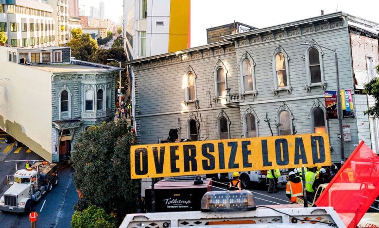 Parade follows 139-year-old San Francisco Victorian residence because it’s moved by a truck seven blocks to its new location